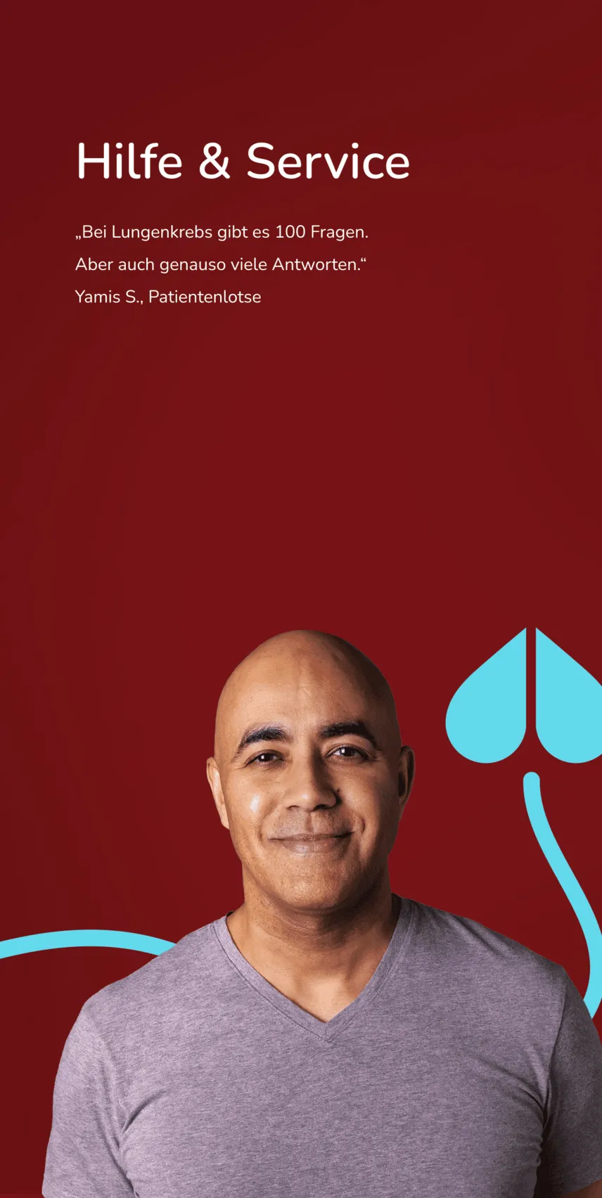 Ein Mann mit Glatze in lila T-Shirt steht vor einem grauem Hintergrund. Ein Mann mit Glatze in lila T-Shirt steht vor einem grauem Hintergrund.